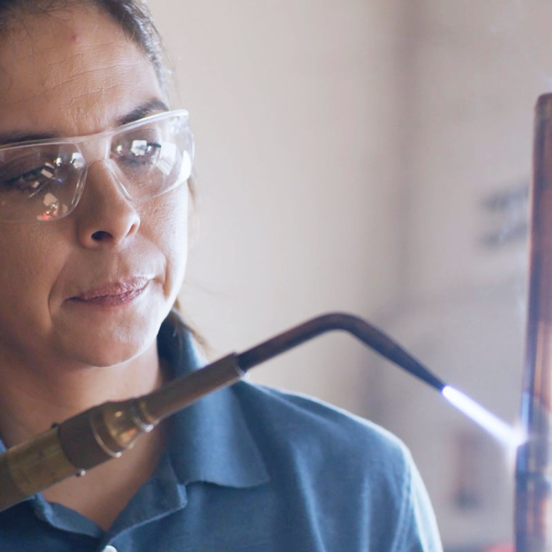 woman with blow torch