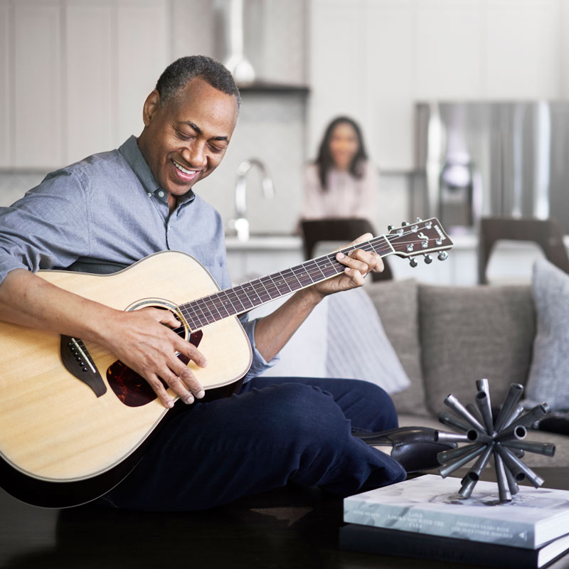 man playing guitar